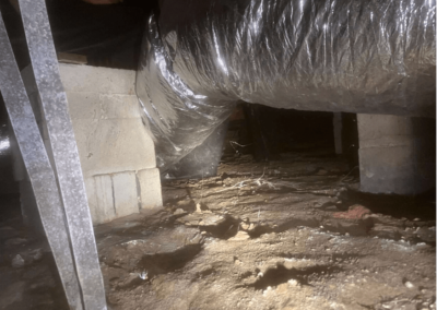 Close-up of deteriorated insulation in West End, NC crawlspace