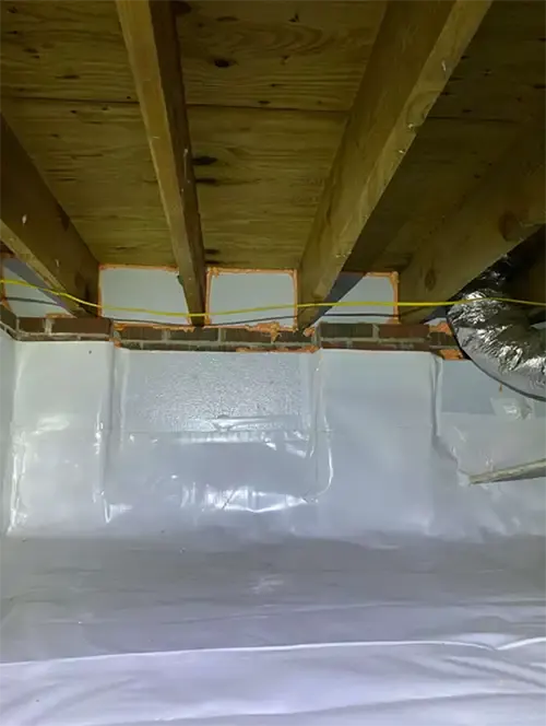 After – Fully sealed crawl space with foam insulation and clean liner