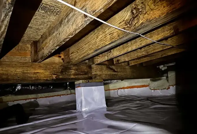 After Wrapped support column and sealed foundation wall