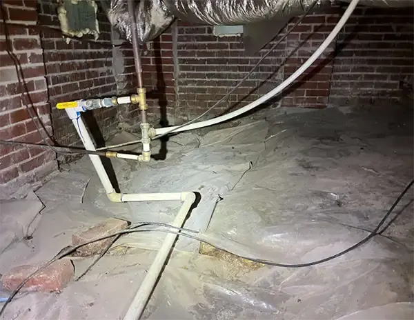 Before – Damaged insulation and exposed brick