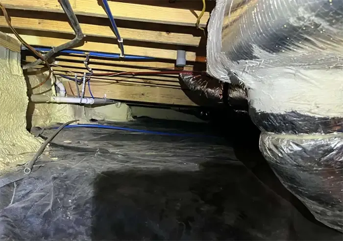 Before Spray foam on ductwork and exposed utilities