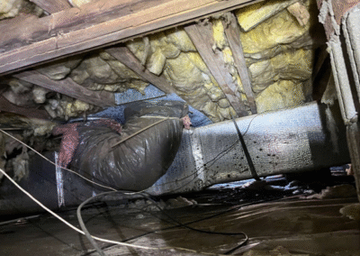 Damaged Ductwork And Insulation In Crawl Space