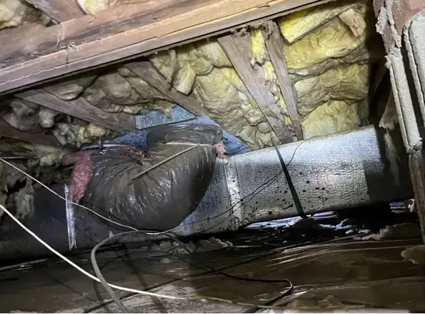 Damaged Ductwork and Insulation in Crawl Space